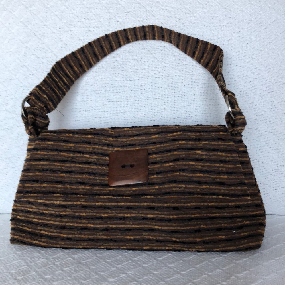 Dana Herbert purse. H 6 1/2 L 13 W 3